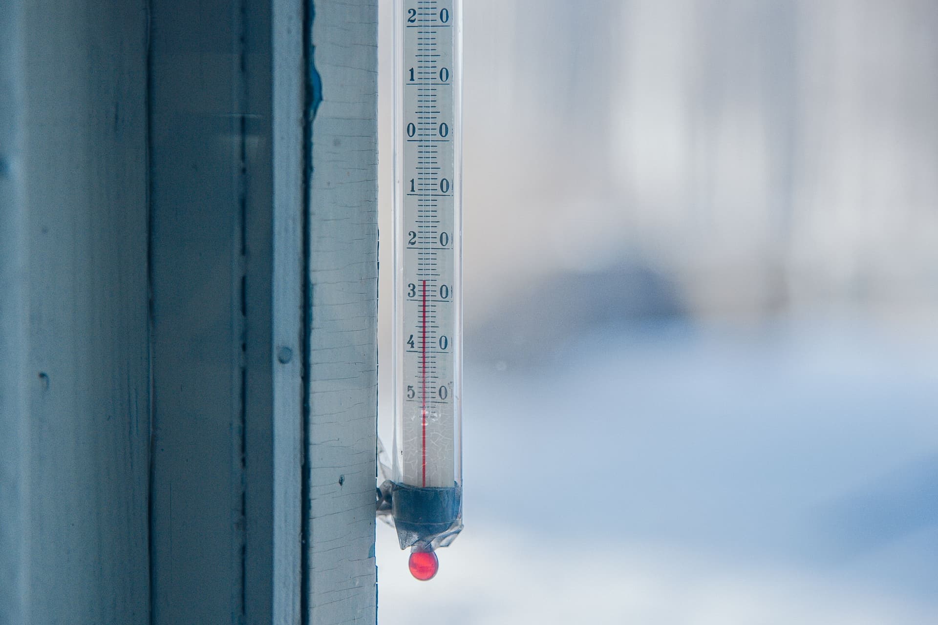 A thermometer showing a temperature below freezing